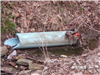 Broken Piece of Pipe in Ditch