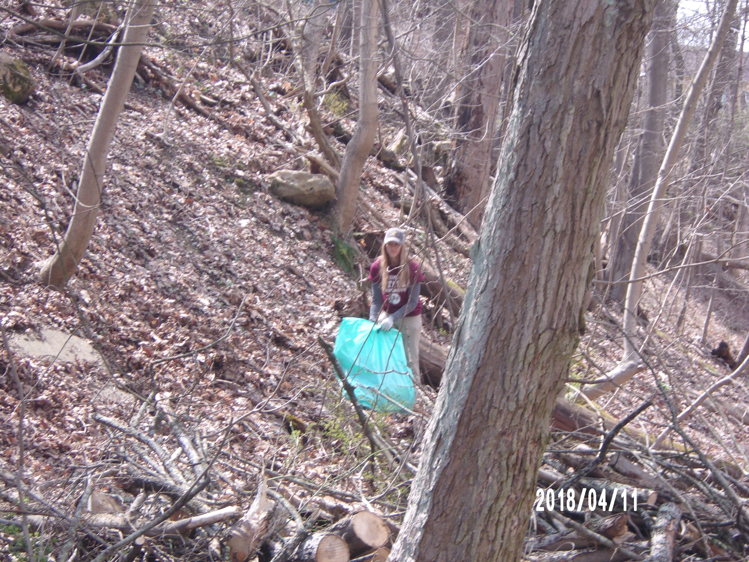 Woman Gathering Debris